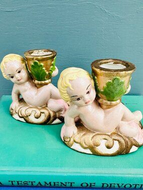 Vintage 1960s pair of ceramic cherub candlestick holders. mid century decor